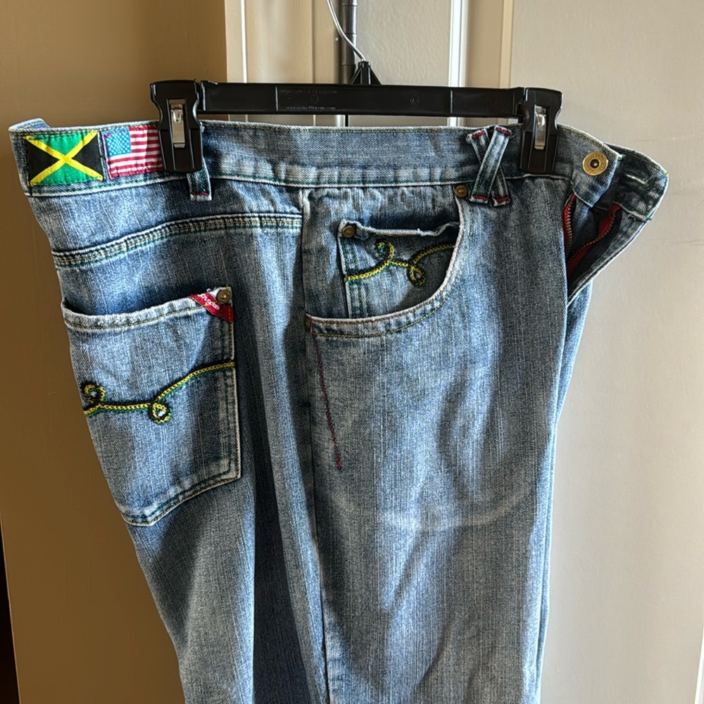 LRG Roots and equipment jeans with embroideries and US Jamaica flags 38-34.